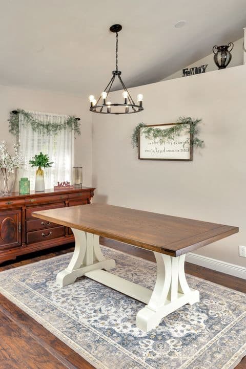 Trestle dining table staged in a living room