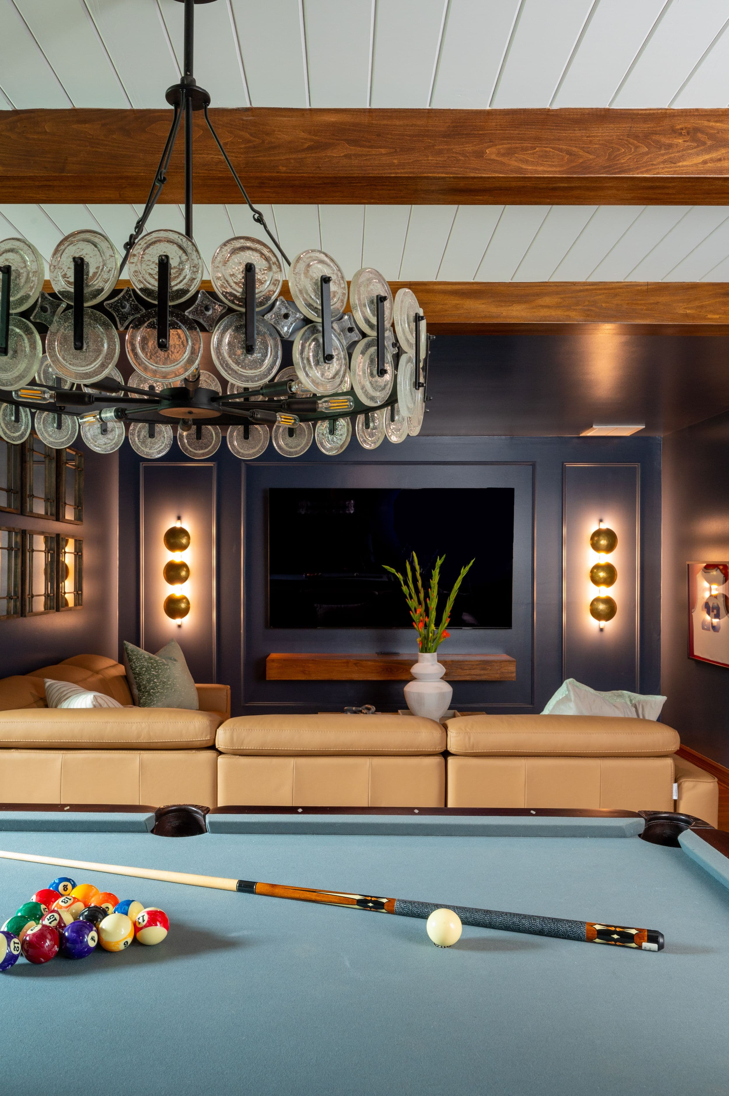 Luxury interior design with pool table and moody colors
