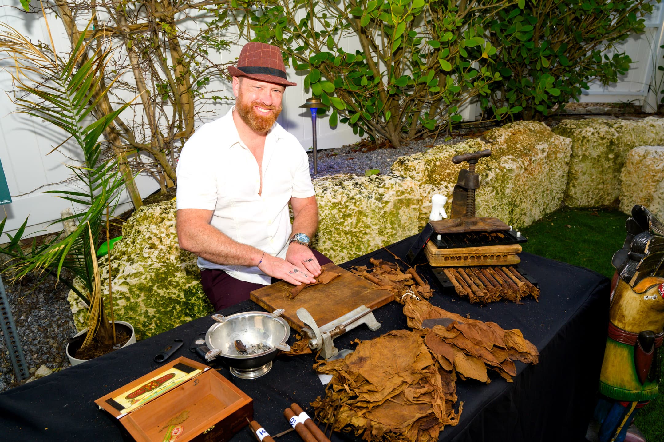 Cigar roller at a private event